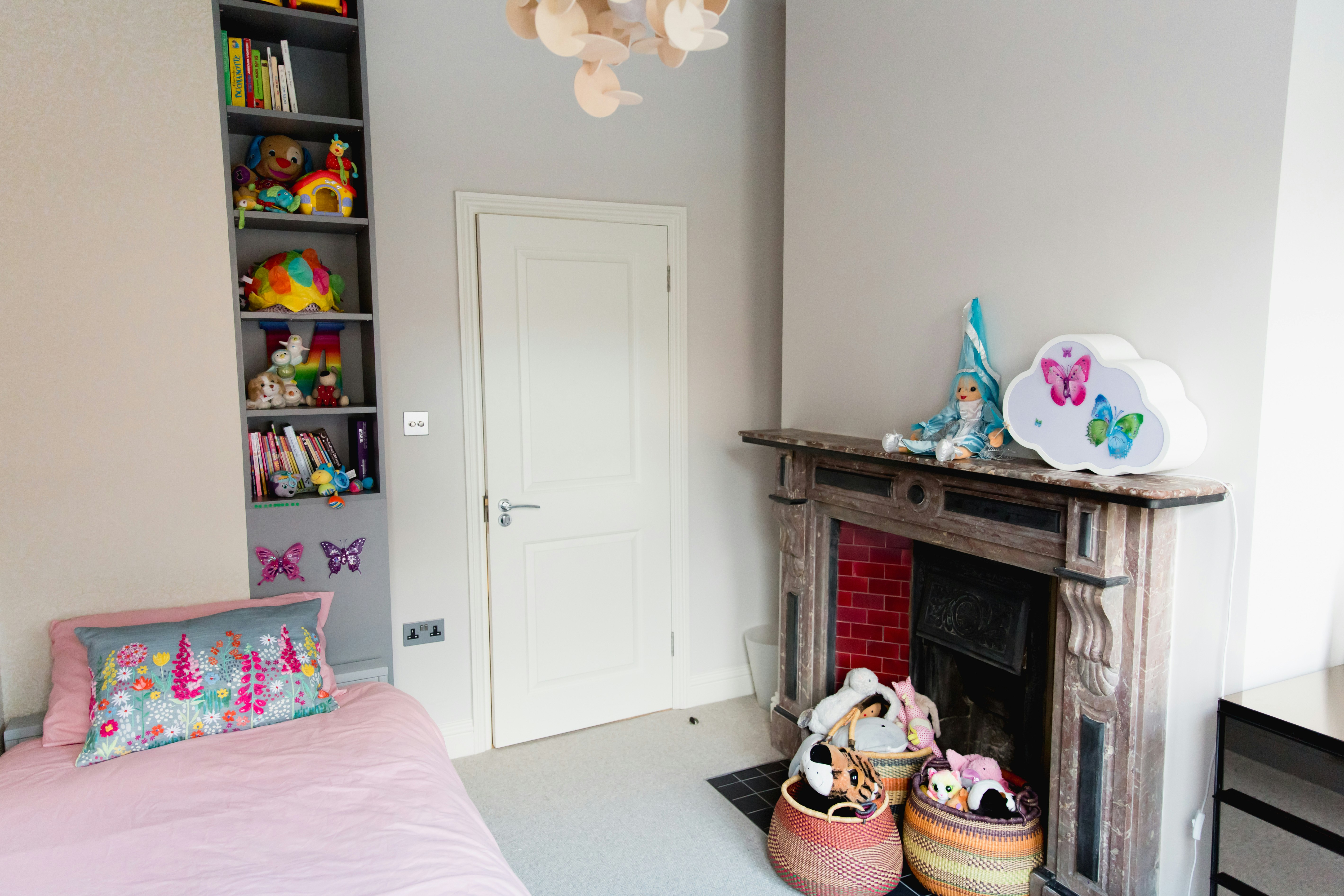 white wooden door near white wooden shelf